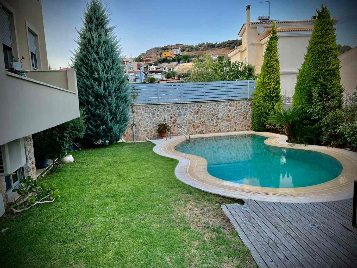 Ένας Ευχάριστος Χώρος Με Πισίνα Villa ปอร์โตราฟตี ภายนอก รูปภาพ