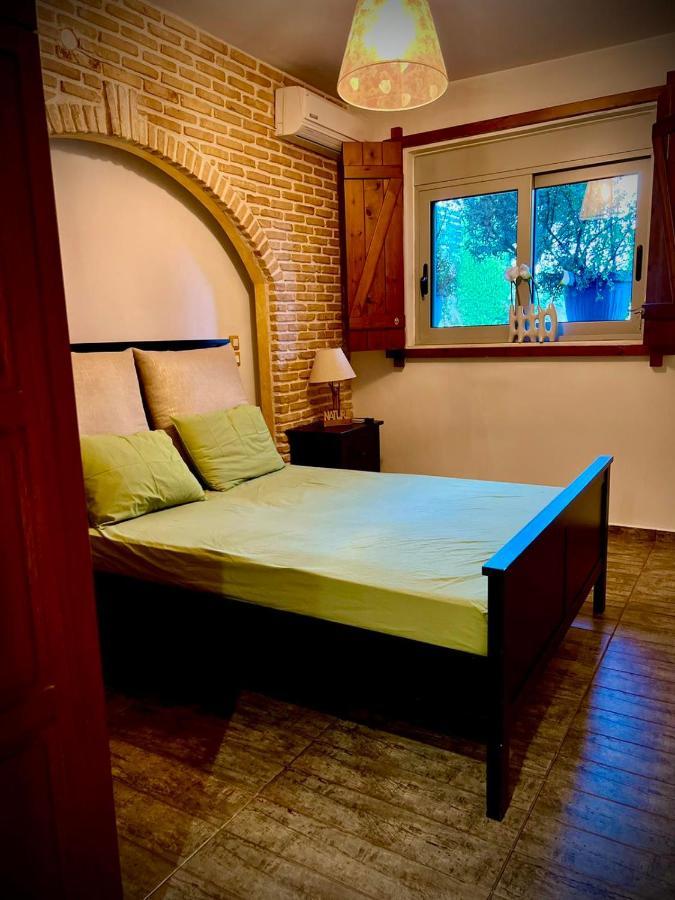 Ένας Ευχάριστος Χώρος Με Πισίνα Villa ปอร์โตราฟตี ภายนอก รูปภาพ